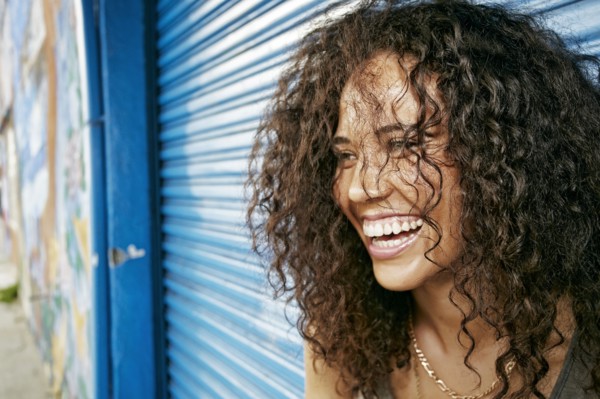 Mixed race woman laughing