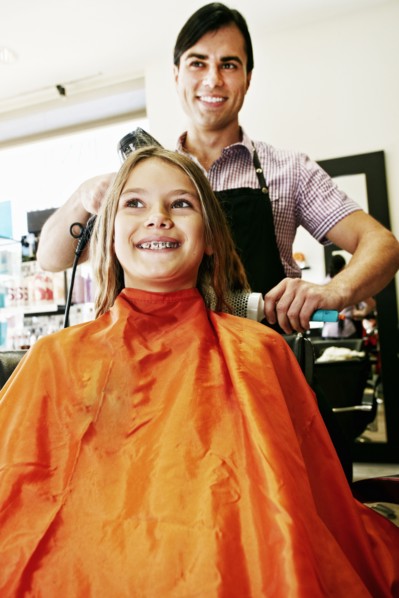 Hairdresser and customer in hair salon