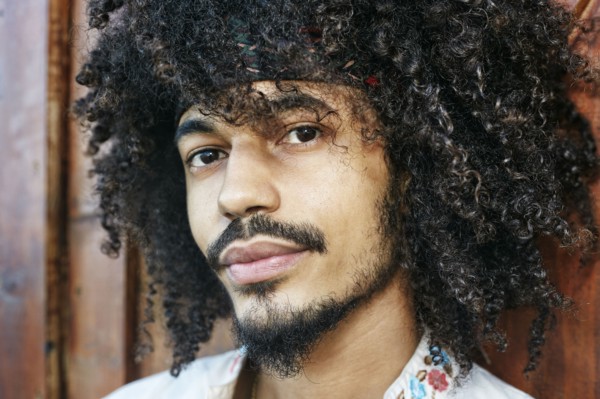 Portrait of serious Mixed Race man