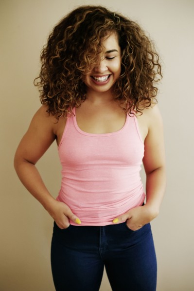 Portrait of laughing Mixed Race woman
