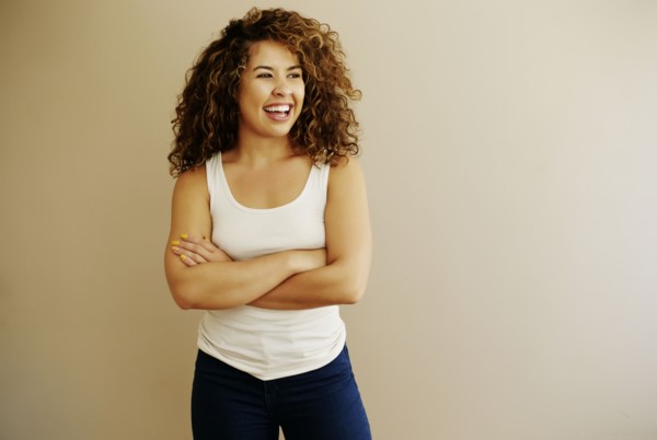 Portrait of laughing Mixed Race woman