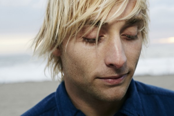 Portrait of pensive Caucasian man at beach