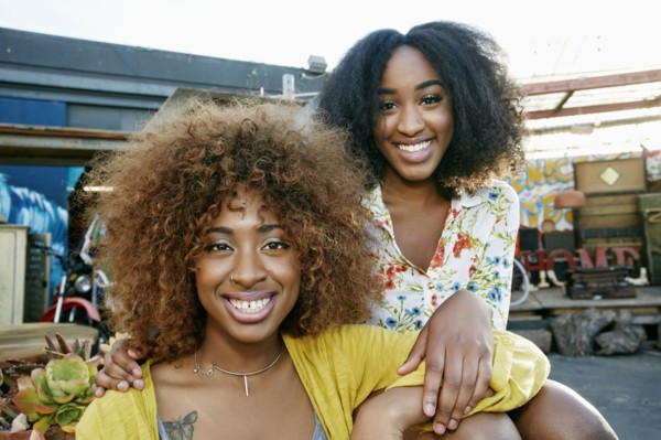 Women smiling outdoors