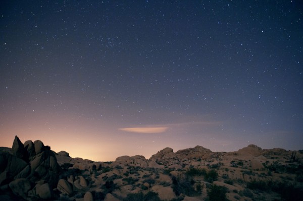 Stars in sky over desert