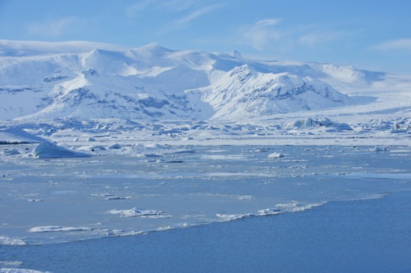 Snowy mountains overlooking arctic landscape