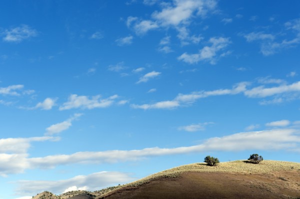 Blue sky over hill