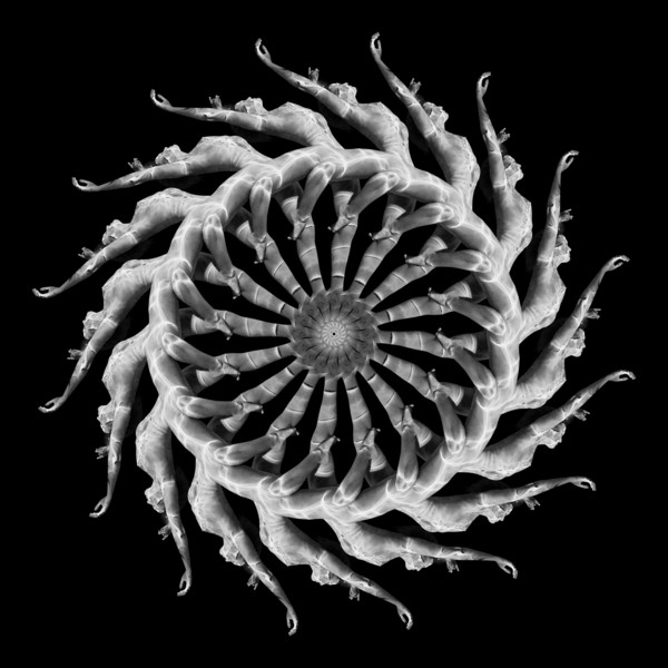 Multiple exposure of Caucasian woman swimming in spiral