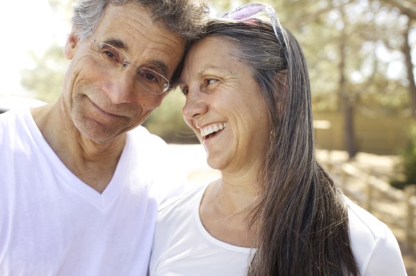 Older Caucasian couple smiling