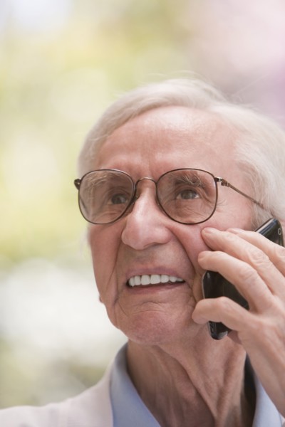 Senior Chilean man talking on cell phone