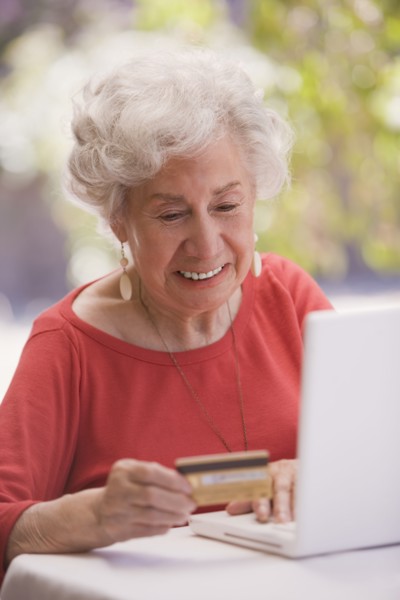 Chilean woman shopping online with credit card