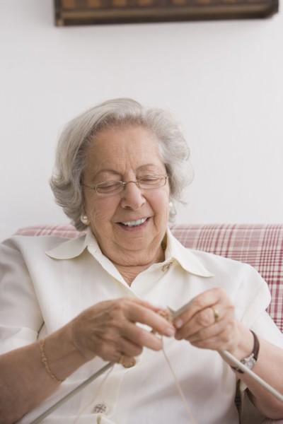 Senior Chilean woman knitting