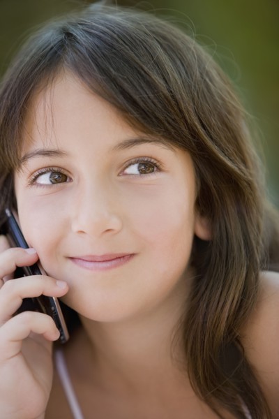 Hispanic girl talking on cell phone