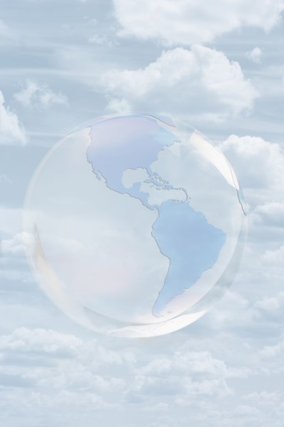 Transparent globe floating in sky