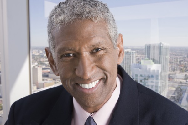 Smiling mixed race businessman