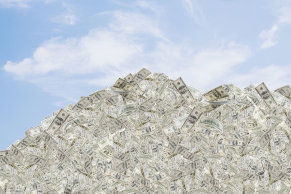 Illustration of mountain of dollar bills