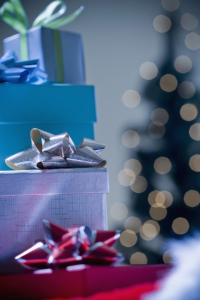 Stacks of wrapped Christmas gifts