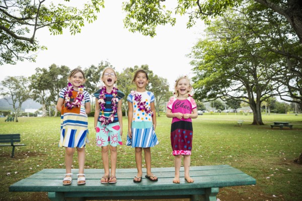 Girls standing together on picnic table