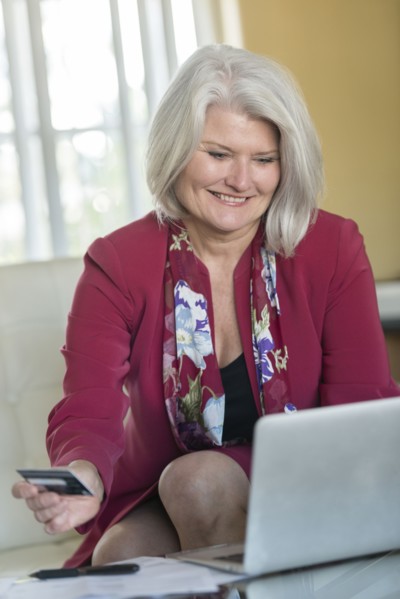 Caucasian older woman shopping online