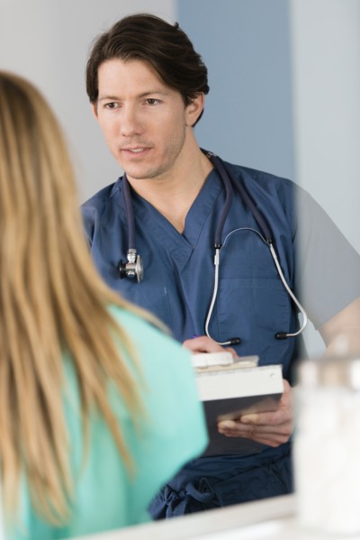 Doctor talking to patient