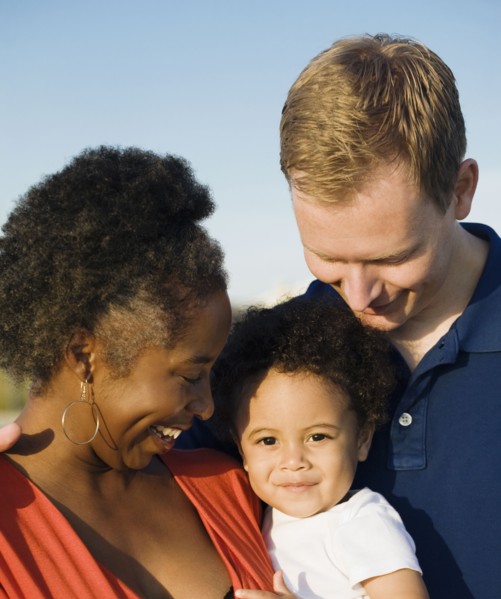 Multi-ethnic family smiling