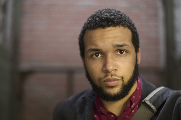 Serious mixed race businessman
