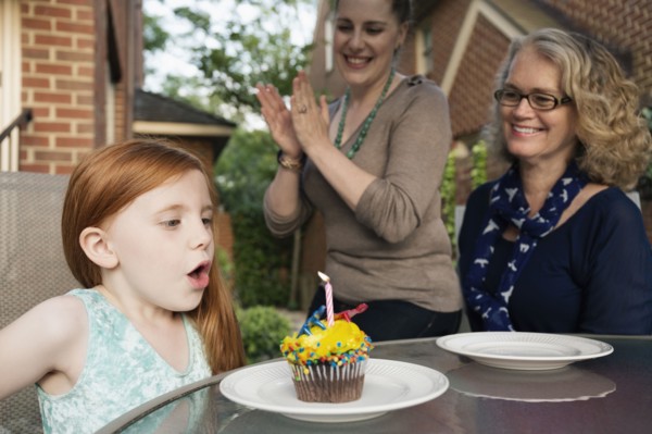 Three generations of Caucasian women celebrating birthday