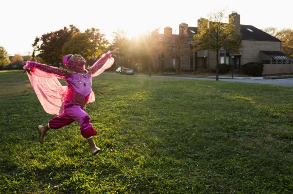 African American girl dancing in princess costume