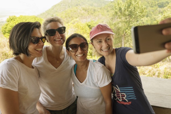 Friends taking selfie outdoors