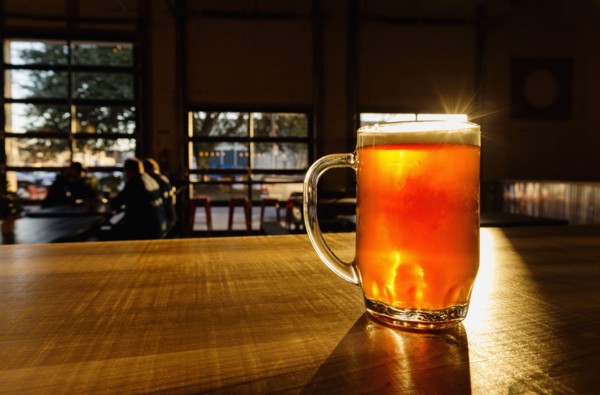 Glass of beer on counter