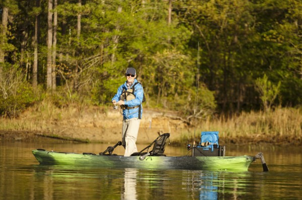 Caucasian man fishing on kayak