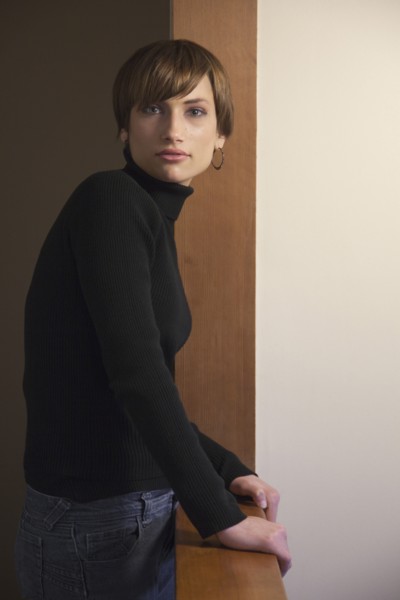 Caucasian woman standing at banister