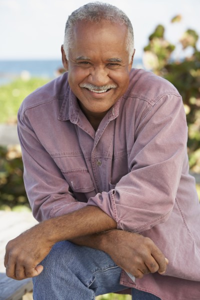 Senior man laughing outdoors
