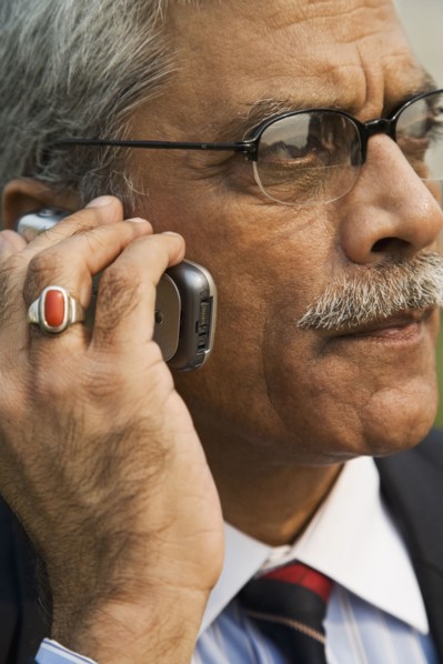 Indian businessman talking on cell phone