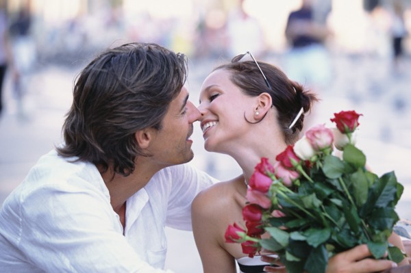 Couple kissing outdoors