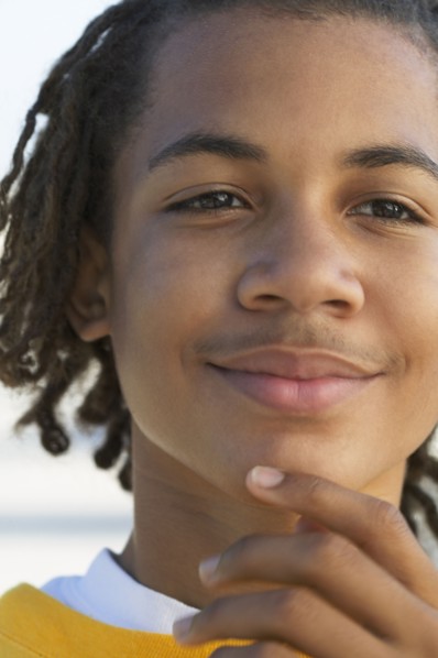 African American teenage boy smiling