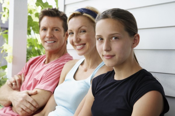 Family sitting together outdoors