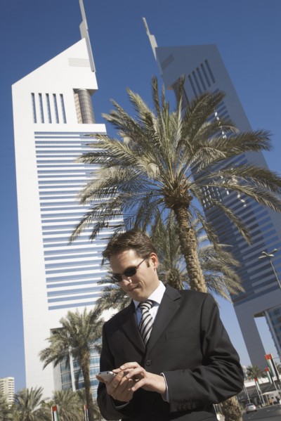 Caucasian businessman using cell phone