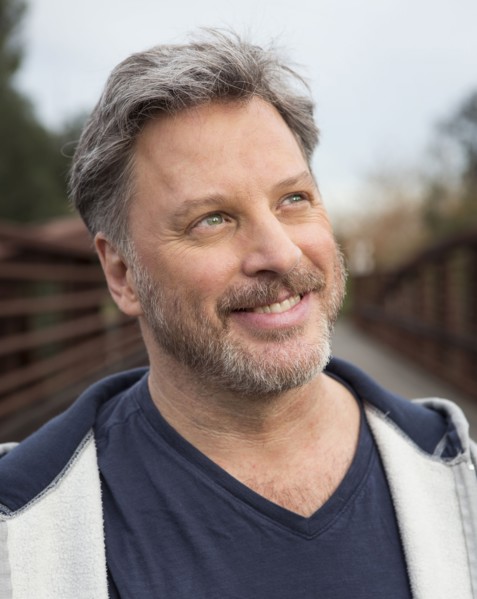 Close up of smiling face of Caucasian man