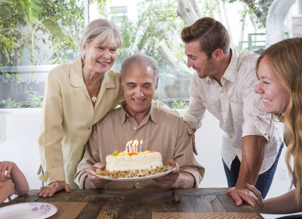 Caucasian family celebrating birthday at table