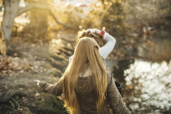 Caucasian women walking in park