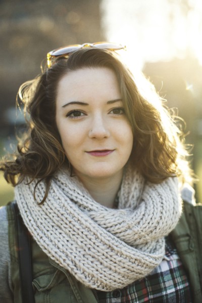 Caucasian woman wearing knitted scarf