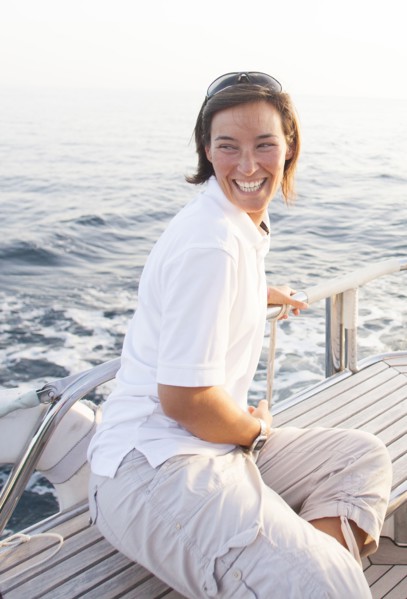 Caucasian woman smiling on boat deck
