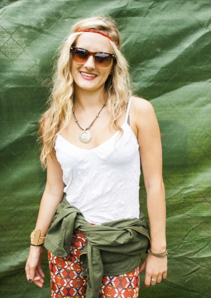 Caucasian woman smiling near tarp