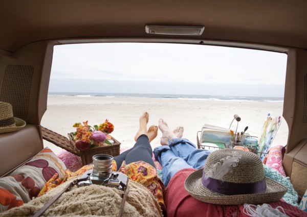 Caucasian mother and daughter relaxing in car