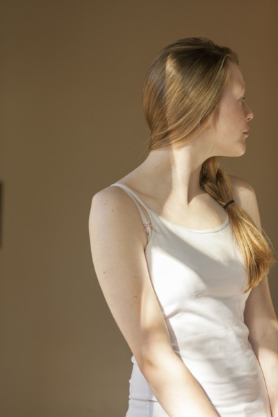 Girl looking over her shoulder