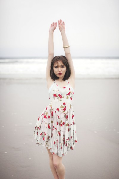 Caucasian woman standing on beach