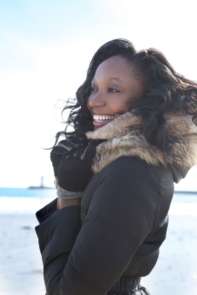 Close up of smiling woman wearing coat