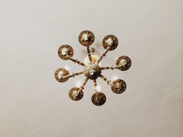 Low angle view of chandelier hanging from ceiling