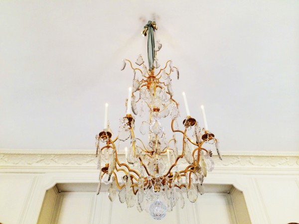 Low angle view of chandelier hanging from ceiling