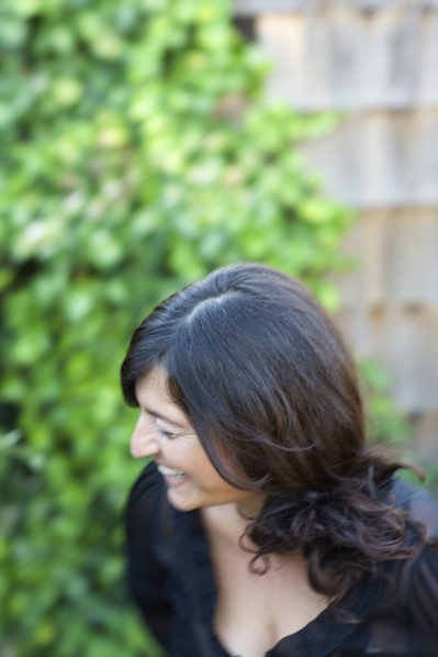 Close up of laughing woman in backyard